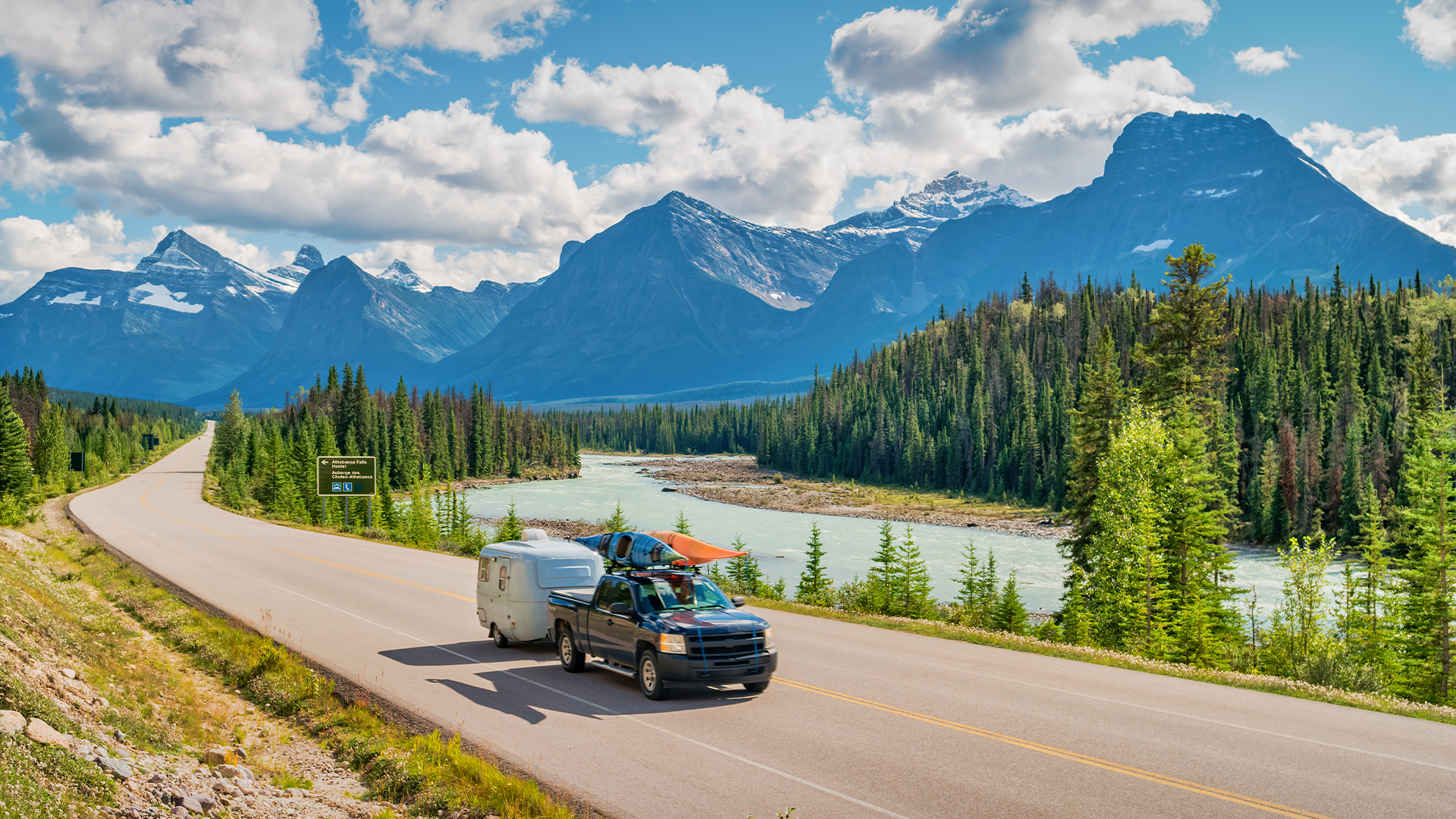 Truck driving through scenic road