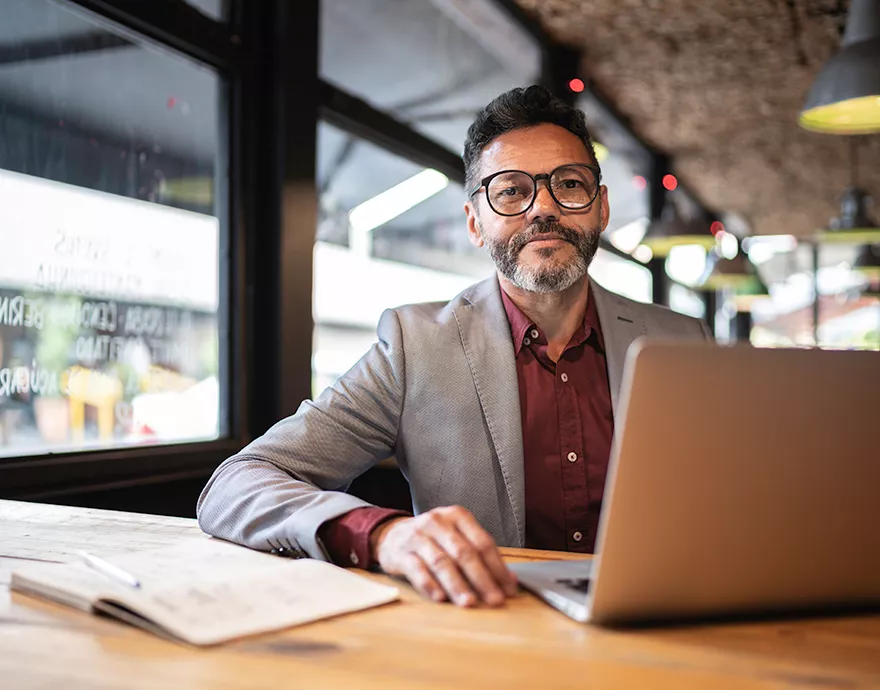 Man sitting at a laptop