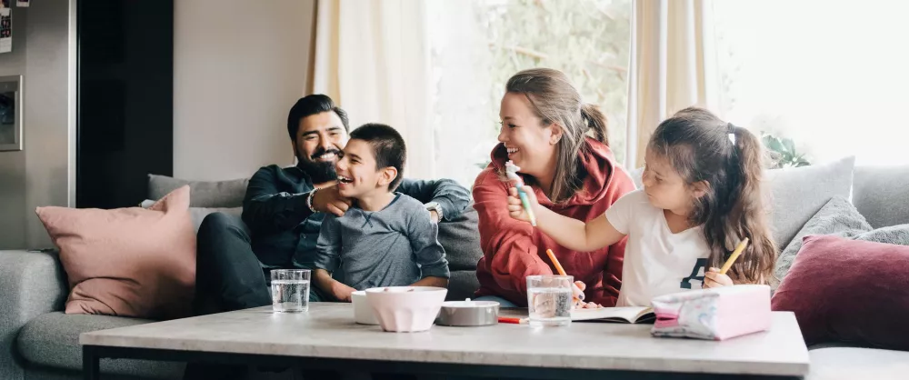 Family sitting on a couch