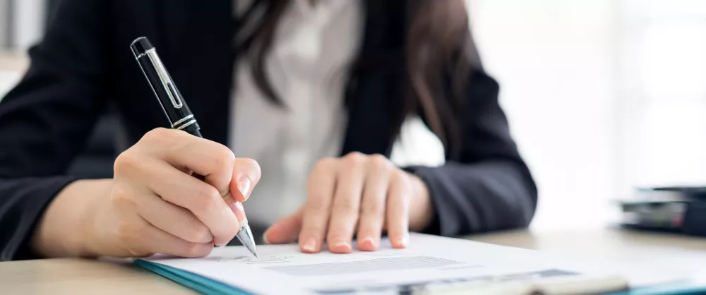 Close up of someone writing