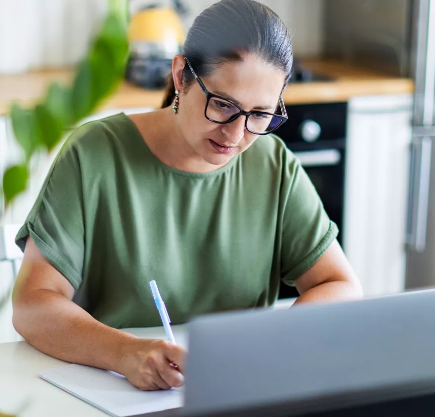 Woman working at a laptop