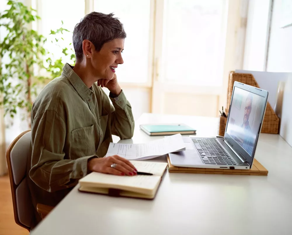 Woman working at a laptop