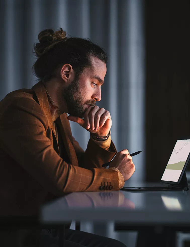 Man looking at a laptop