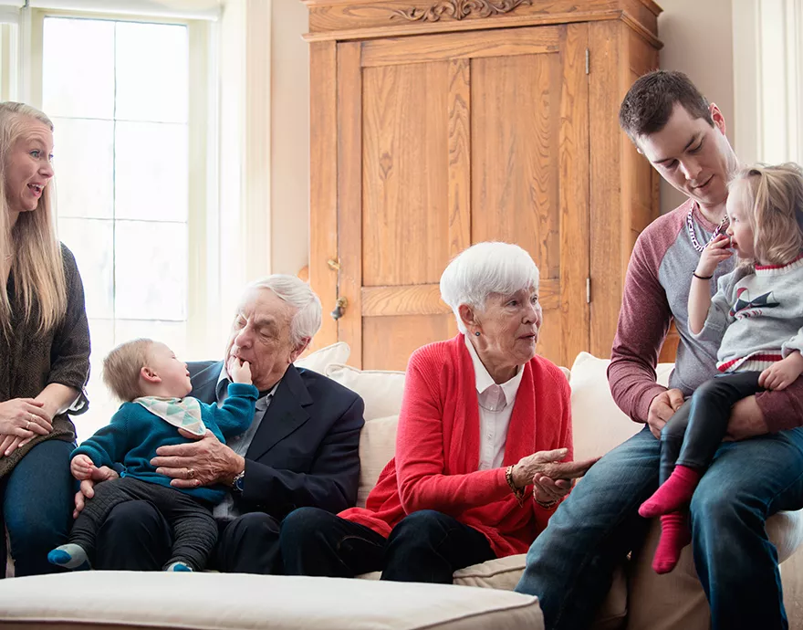 Extended family together in the living room