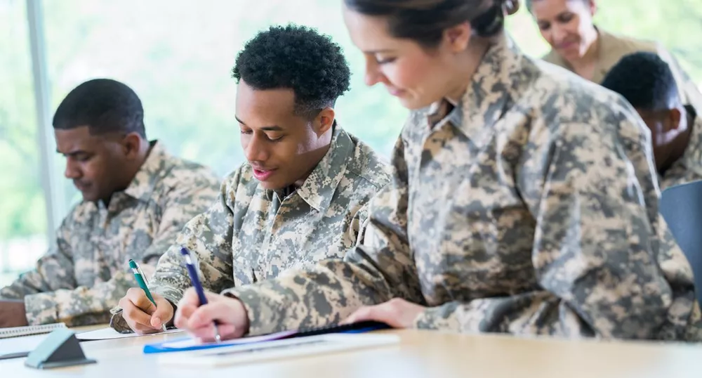 Military veterans writing together