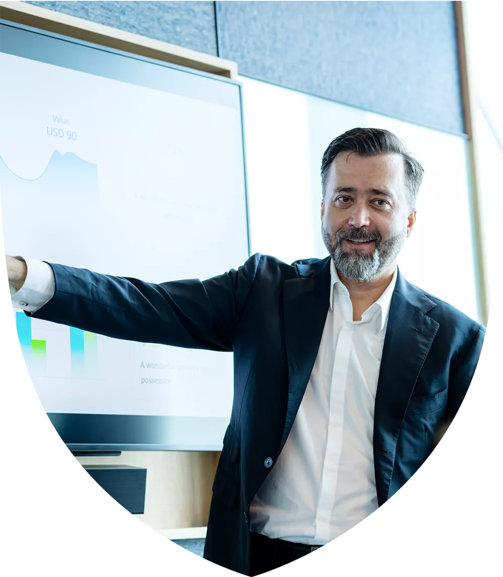 Man dressed in work suit giving a presentation