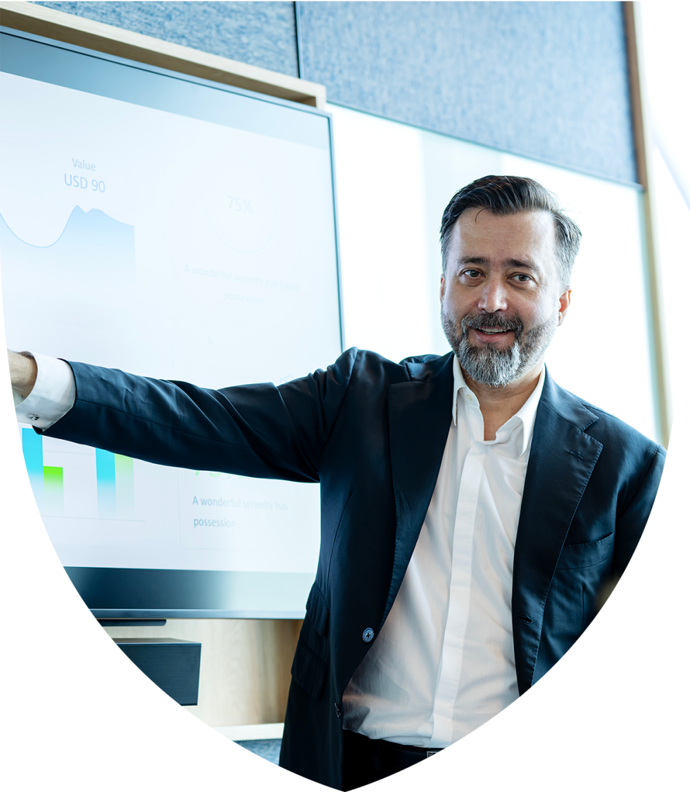 Man dressed in work suit giving a presentation