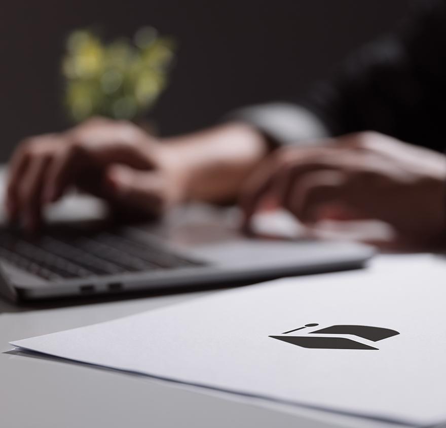 Woman working on laptop at home